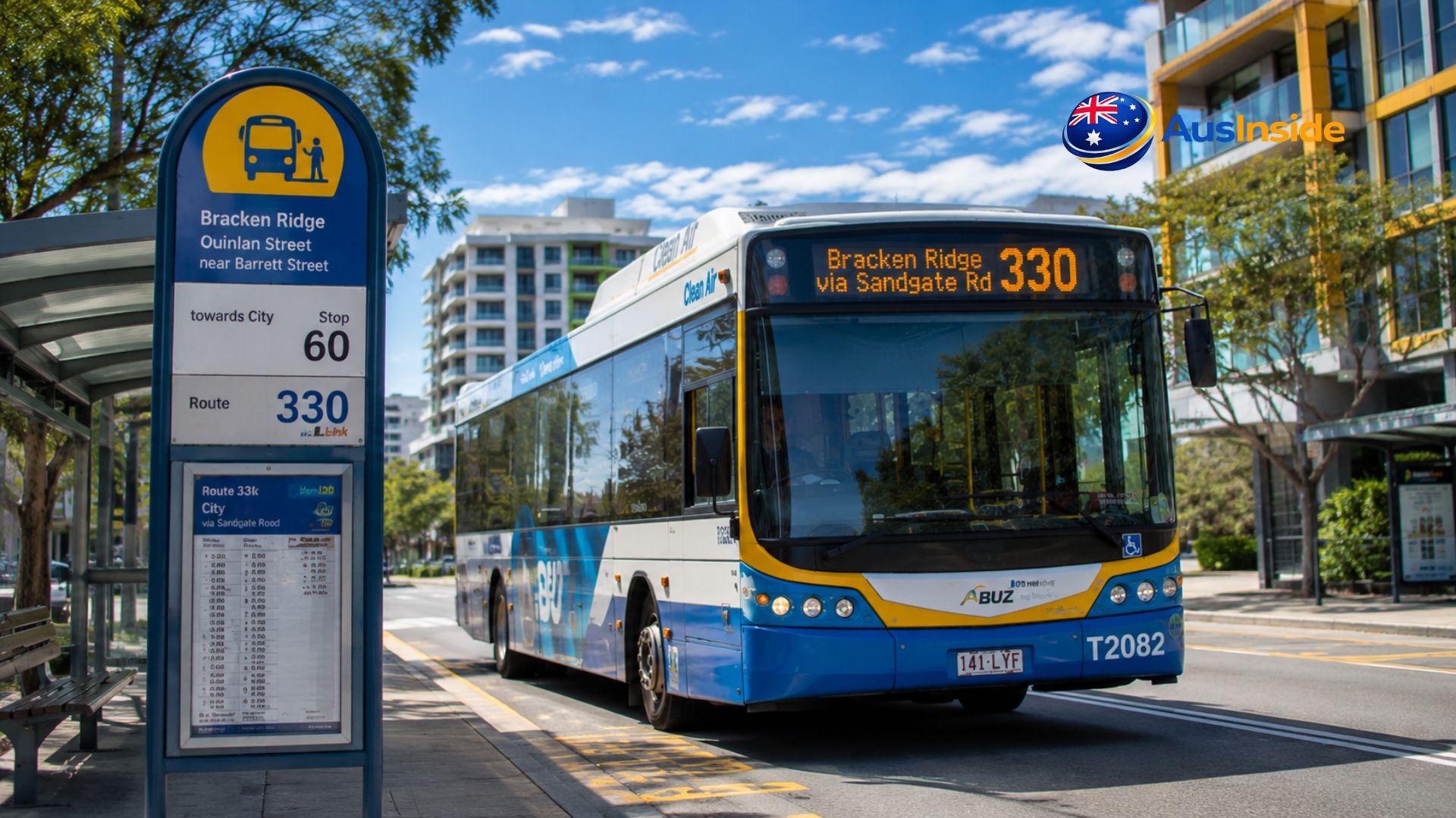 Route 330 Brisbane bus waiting at a Bracken Ridge bus stop on a sunny day with the route display showing Bracken Ridge via Sandgate Road.